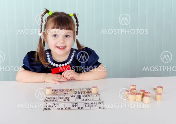 Child at table played with bingo