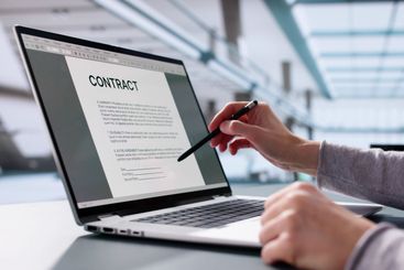 Busy executive insuring trust with legal paperwork