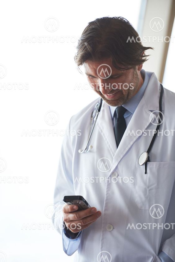 doctor speaking on cellphone