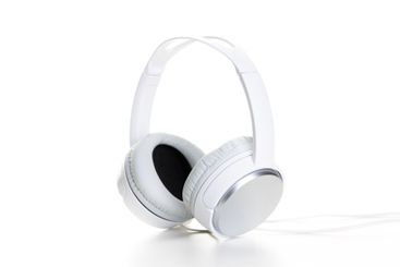 White headphones on white background close up