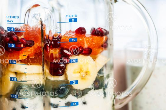 Blender with fruit and yogurt for smoothies