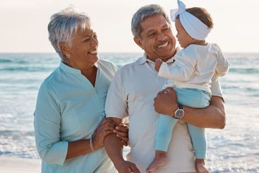 Grandparents, travel or baby at beach with smile, love...
