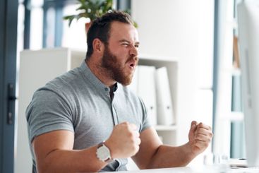 Celebration, winner and business man on computer for...