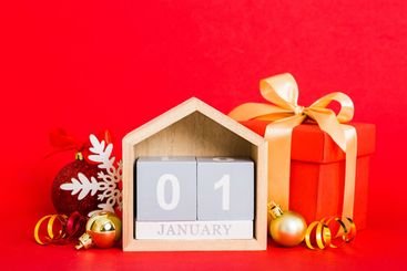 1 january. Christmas composition on colored background...