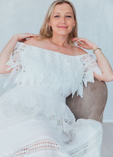 woman in summer dress smiling