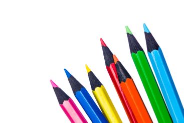 Colorful pencils arranged in a row showcasing a variety...