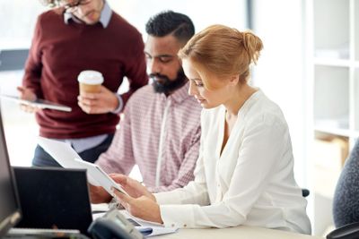 business team with tablet pc in office