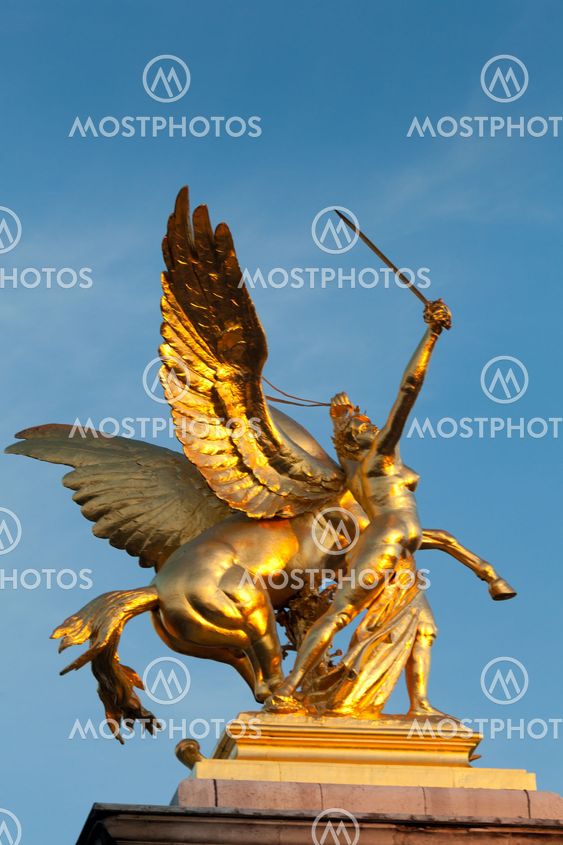 Figure in the Pont of Alexander III, Paris, France