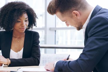 Businessman, writing or contract with documents for...