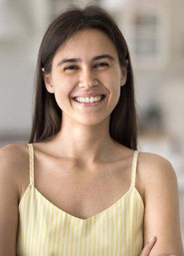 Vertical headshot portrait smiling beautiful teenage...