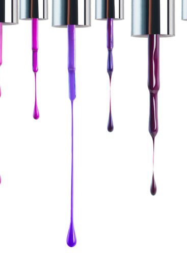 Dripping droplets. Multi-coloured nailpolish dripping...