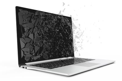 Computer or laptop with broken screen isolated on white...