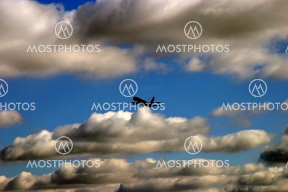 Airplane in clouds