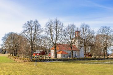 Old idyllic church in the swedish countryside at springtime