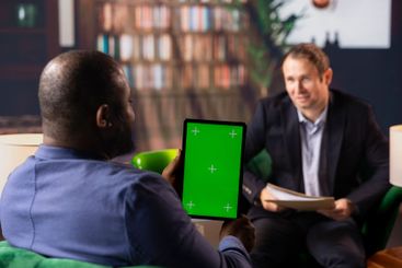 African american and caucasian professionals engage in a...