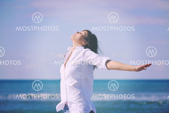 happy young woman on beach
