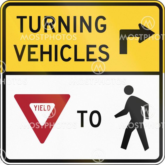 United States MUTCD road sign - Turning vehicles yield to pedestrians