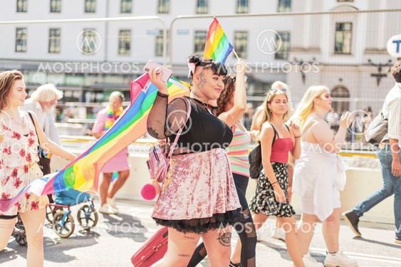 Happy group of friends during the pride parade in Stockholm