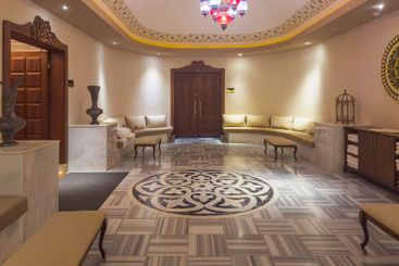 Interior of a luxury hotel lobby in the evening