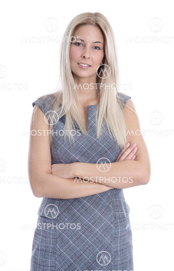 Studio shot of blond successful woman in dress with arms...