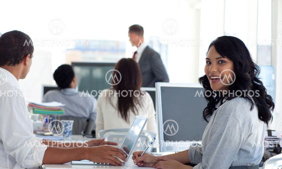 Businesswoman smiling in a presentation
