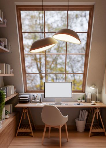 The interior of a contemporary, cozy beige home office...