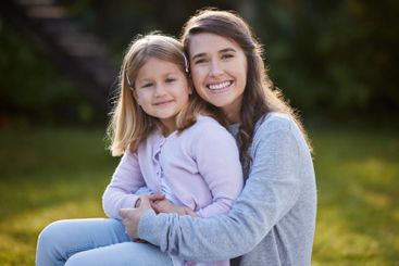 Portrait, hug and girl with mother, love and joy with...