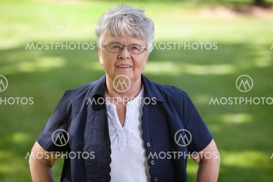 Senior woman standing in park