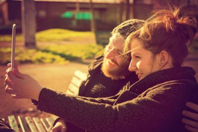young couple in love using tablet
