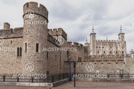London, UK - April 2018: Exterior view of Her Majesty's Royal Palace and Fortress of the Tower of London, a historic castle and popular tourist attraction located on the north bank of the River Thames in central London, England