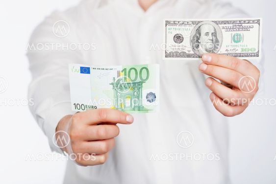 Man with dollar and euro