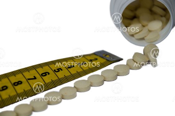 Measuring tape and pills