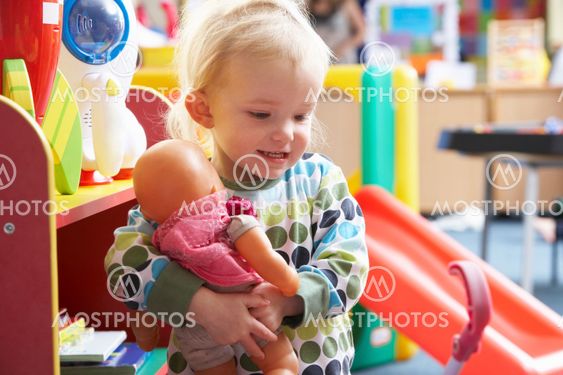 Young girl playing with toys