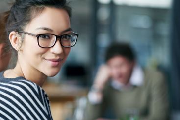 Professional woman, portrait and meeting at startup,...