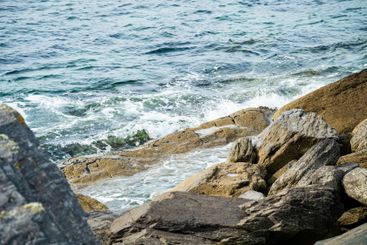 Rough rocky shore along famous Ring of Kerry route....