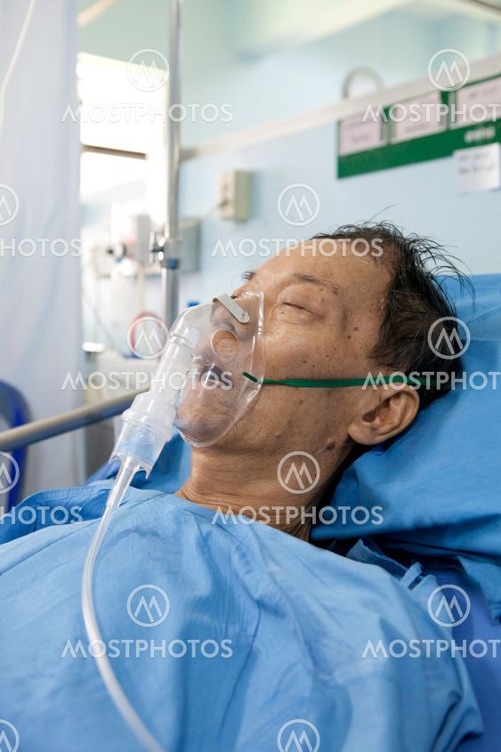 old man patient in treatment room