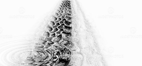 Tyre track and puddle ripples
