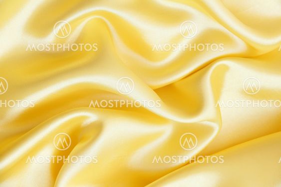 Smooth elegant golden silk as background