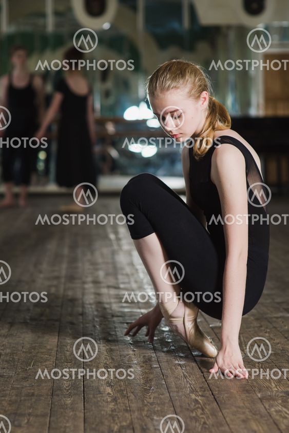 Woman Sitting On Her Foot By Oleksandr Lypa Mostphotos