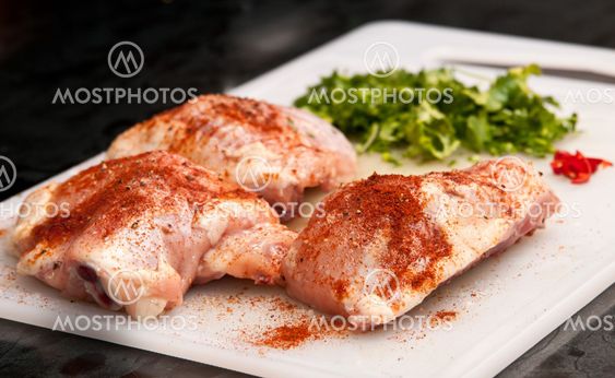 Raw chicken, with spices, ready for cooking