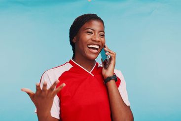 Black woman, phone call and happy in studio for sports,...