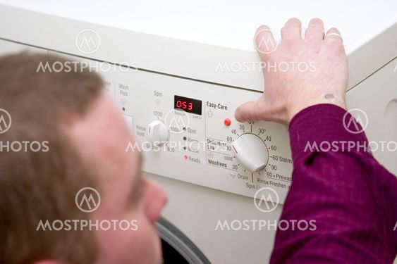 Blind man at a Washing machine