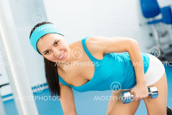 female athlete dumbbell