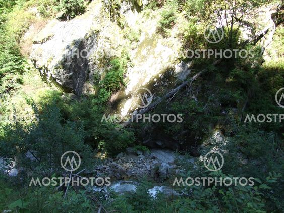 River flowing through the mountains at Costesti, Romania