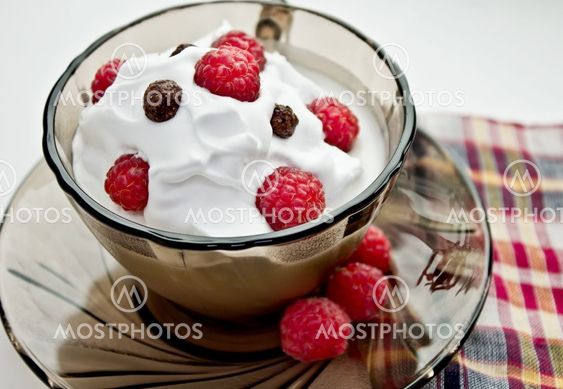 Closeup cup of dessert with ice-cream