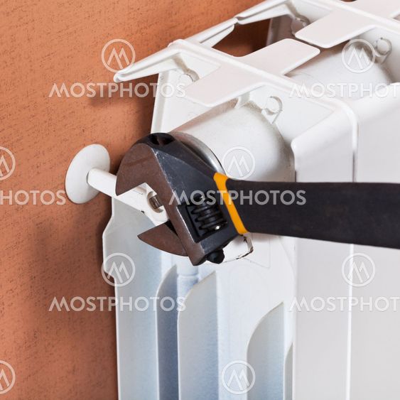 adjusting heating radiator