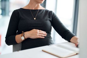 Hands, pregnant and business woman writing to do list,...