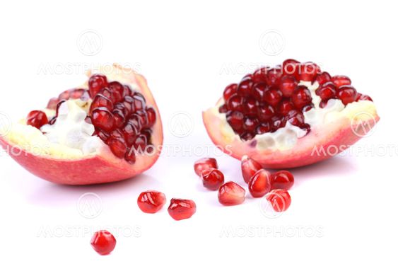 Slices and seeds pomegranate.