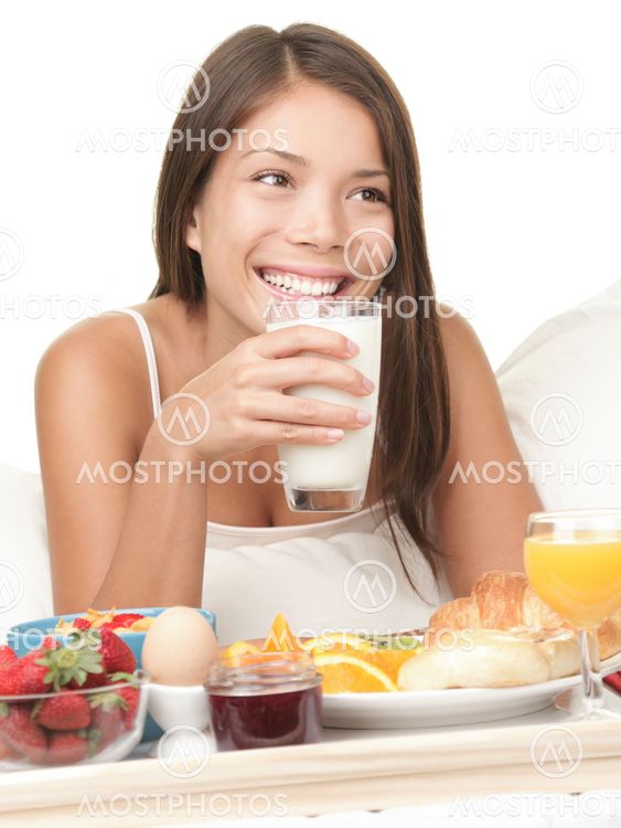 Breakfast in bed woman