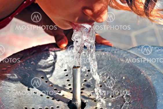 Drinking water on fountain